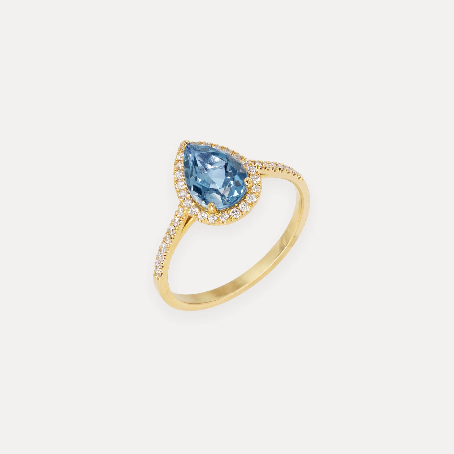 Bague  or rose 18Kt. 2,5g  topaze london blue taille poire 1,3ct. diamant 0,2ct.
